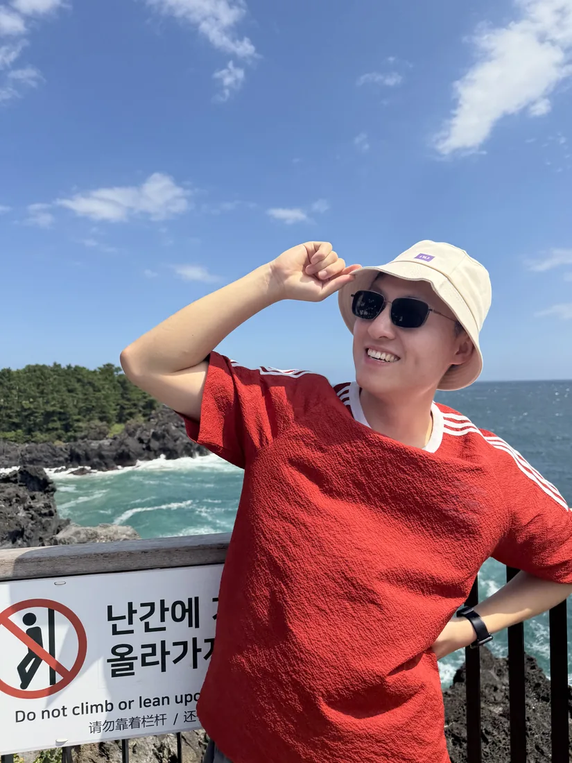 Enjoying the sunshine outdoors on Jeju Island.